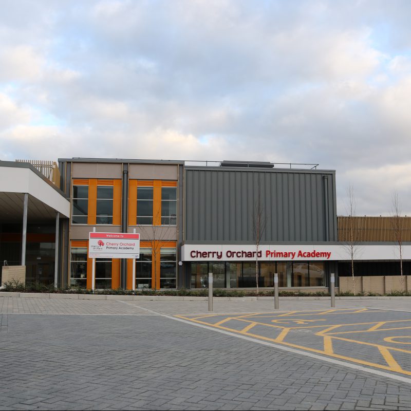 External shot of the main entrance to the Cherry Orchard Primary Academy building.