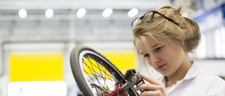 A young student from The Leigh UTC working on electronics.