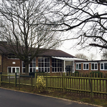 External shot of the main entrance to the Molehill Primary Academy building.