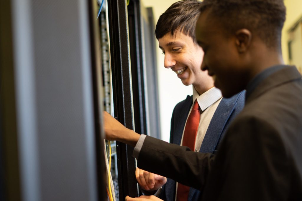 Two students in the server room at The Leigh UTC