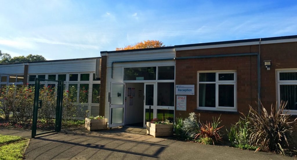 External shot of the main entrance to the Tree Tops Primary Academy building.