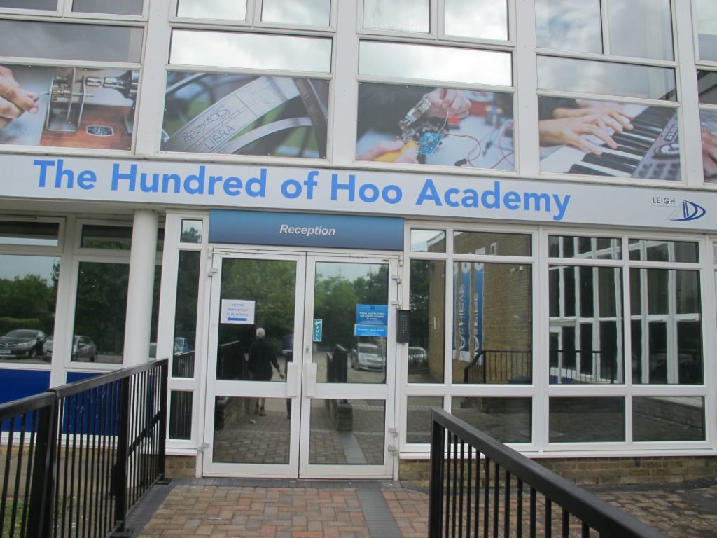 Exterior photo of the main entrance to The Hundred of Hoo Academy building.