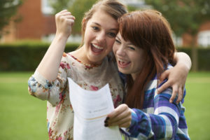 Two girls celebrating results