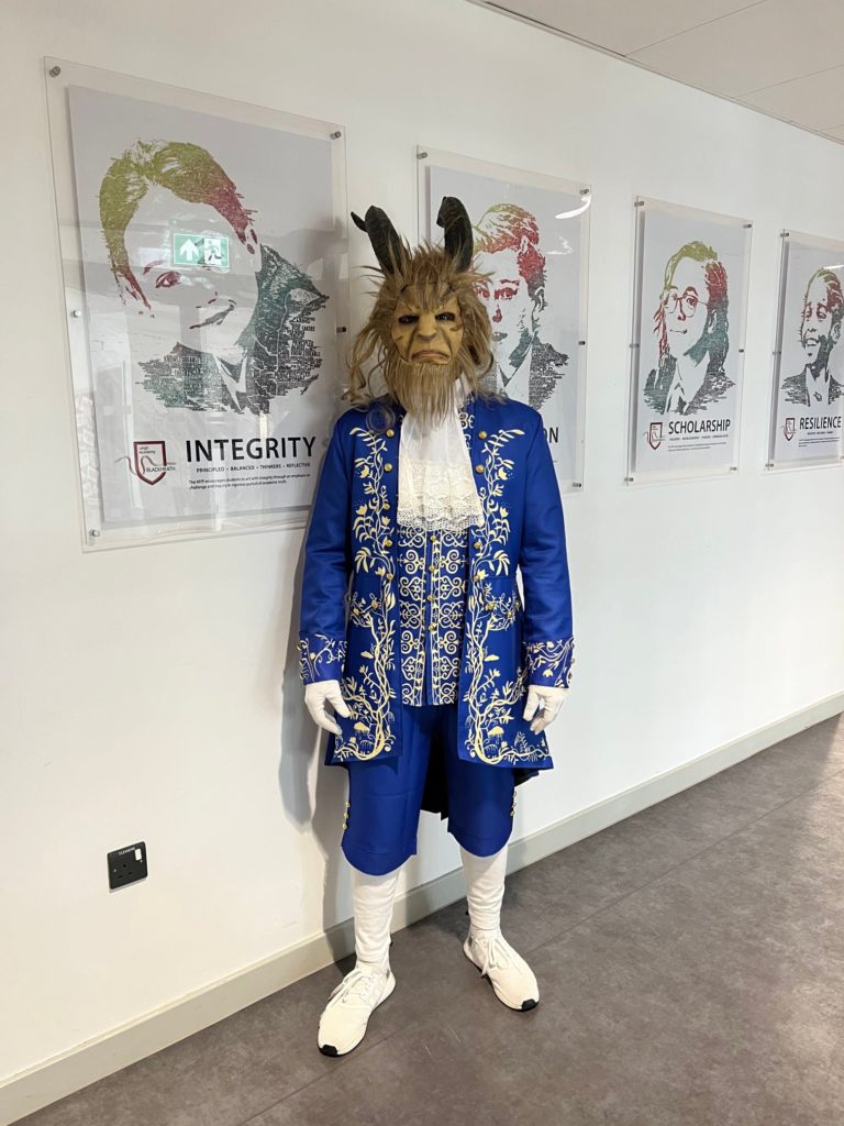 A staff member dressed up on World Book Day from LAB