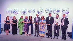 Photo of award winners holding their trophies alongside Chief Executive Simon Beamish at the LAT Awards Ceremony 2022.