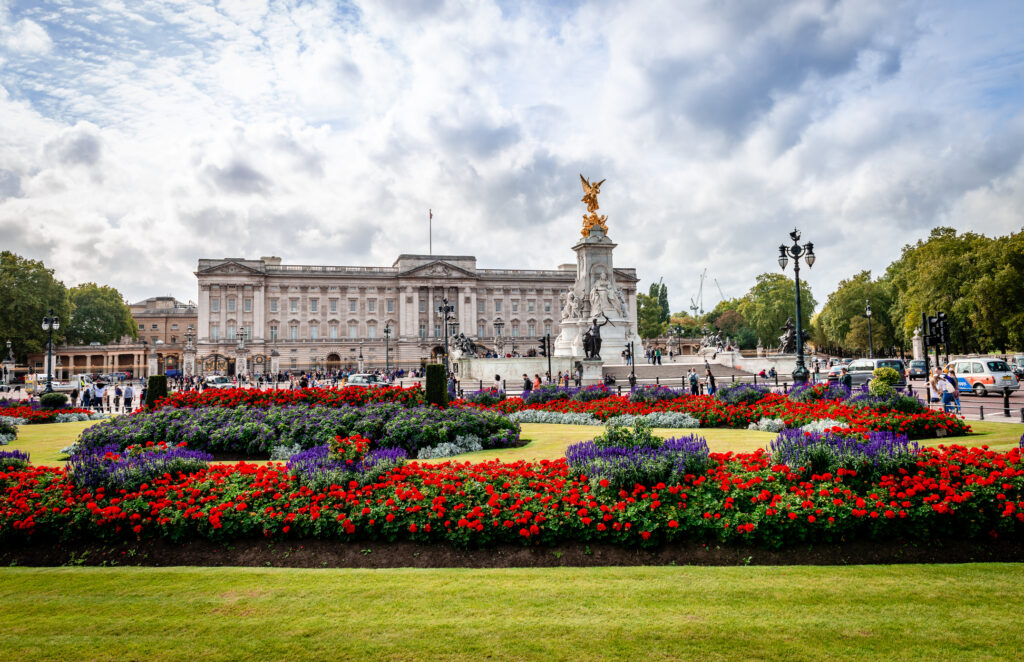 London / UK - September 20 2018: View of the Victoria Memorial, the Queen's Garden and the principal facade of Buckingham Palace (the East Front), located at the end of The Mall. Constructed by Edward Blore and (1850) and remodelled by Sir Aston Webb (1913)
